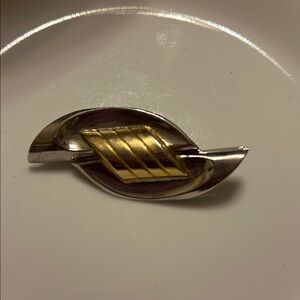 Elegant silver and gold brooch